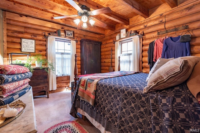 bedroom with wooden ceiling and beam ceiling