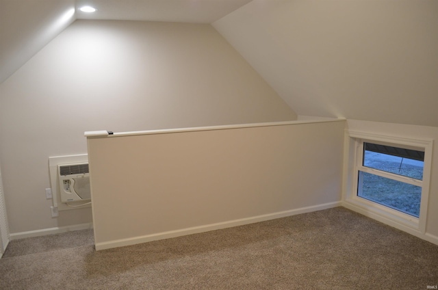 additional living space with carpet, lofted ceiling, baseboards, and recessed lighting