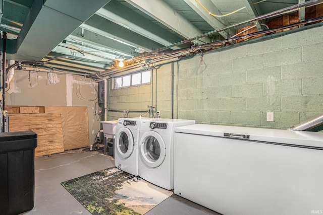 washroom featuring laundry area and independent washer and dryer