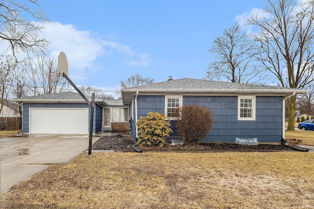 ranch-style house featuring driveway, a garage, a front lawn, and roof with shingles