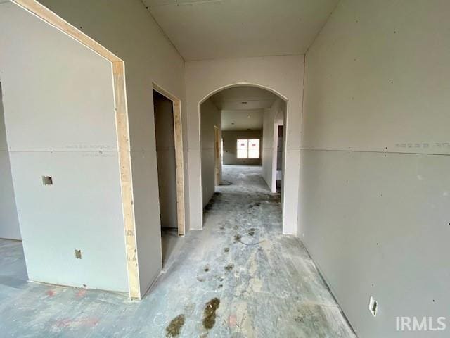 corridor with arched walkways