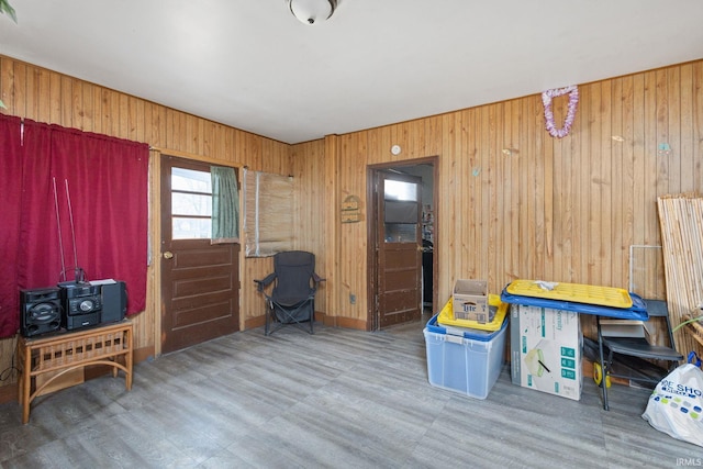 interior space featuring wooden walls