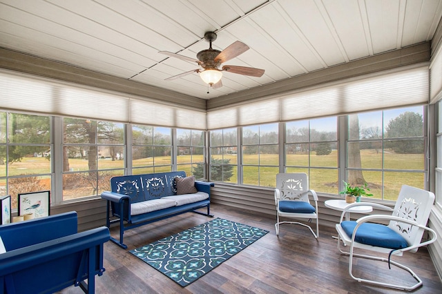 sunroom / solarium featuring wood ceiling and ceiling fan