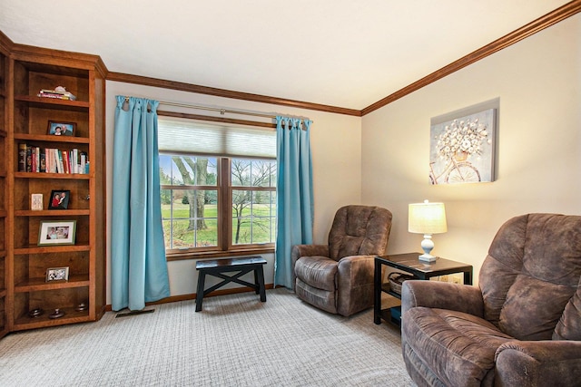 sitting room featuring baseboards, carpet floors, visible vents, and crown molding