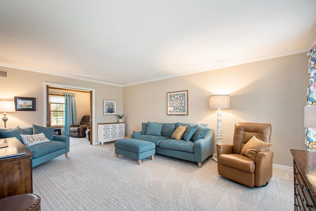 living area with crown molding, baseboards, and light colored carpet