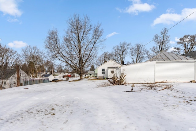 view of yard covered in snow