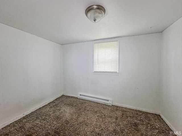 233 W 4th St, Greensburg, IN 47240 - carpeted spare room featuring a baseboard radiator and baseboards