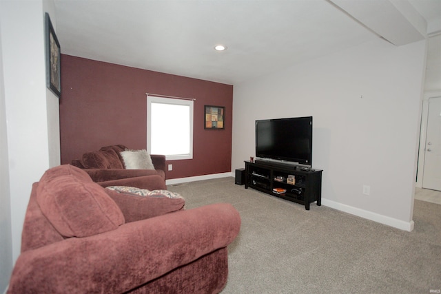 carpeted living area featuring recessed lighting and baseboards