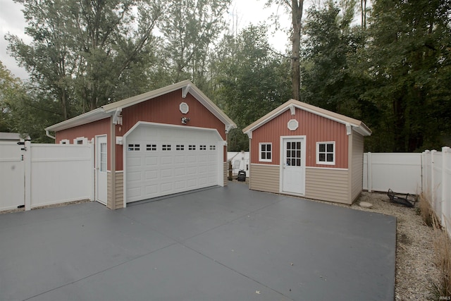 detached garage with fence