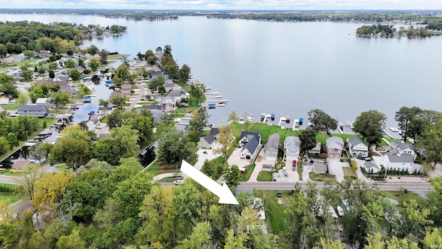 aerial view featuring a residential view and a water view