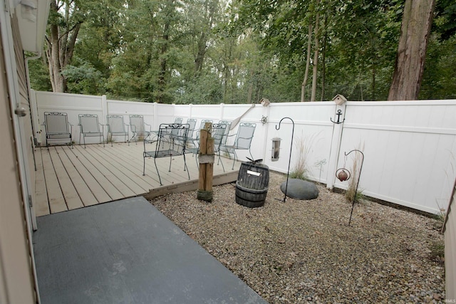 exterior space featuring a deck and a fenced backyard