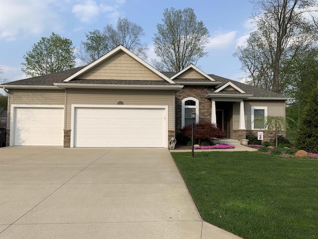 craftsman inspired home featuring stone siding, concrete driveway, an attached garage, and a front yard