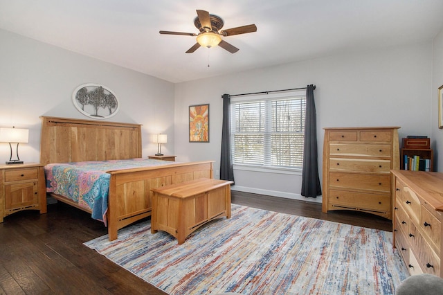 bedroom featuring dark wood-style flooring, ceiling fan, and baseboards