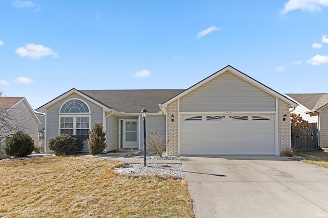 ranch-style house featuring a garage, concrete driveway, and brick siding