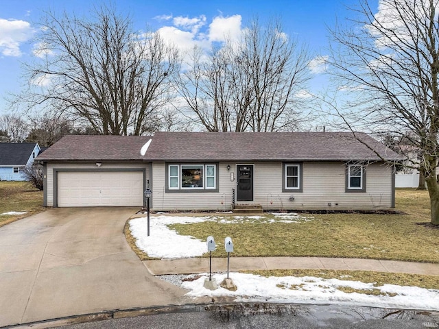 single story home with concrete driveway, a lawn, and an attached garage