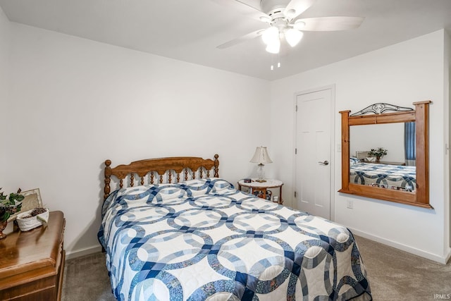 bedroom featuring carpet, baseboards, and a ceiling fan