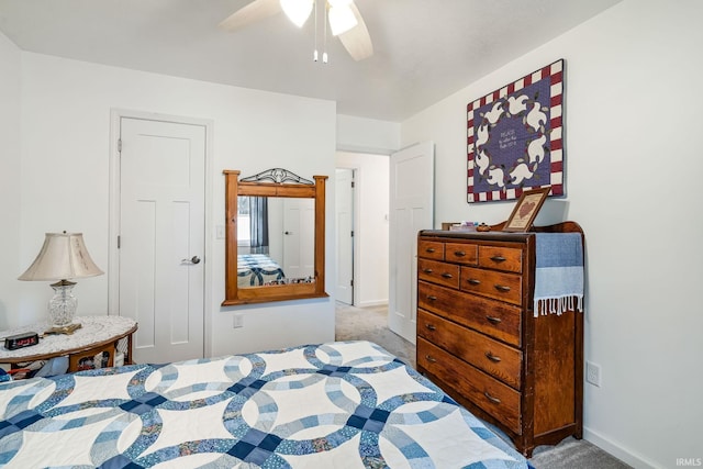 bedroom with carpet floors, baseboards, and a ceiling fan