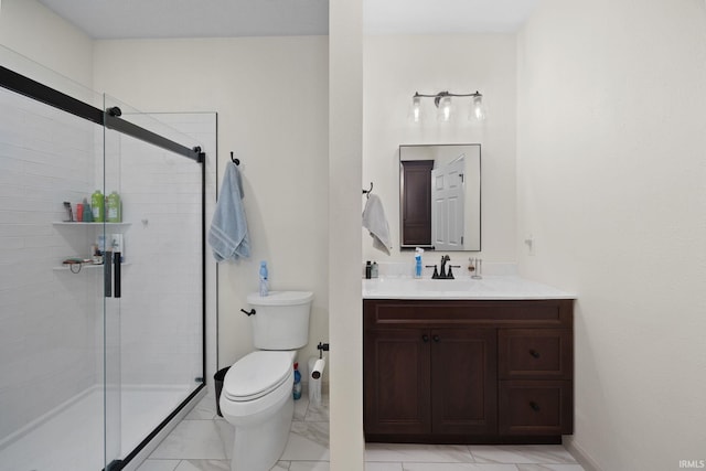 bathroom with a stall shower, baseboards, toilet, marble finish floor, and vanity