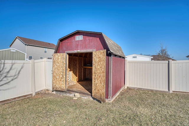 view of shed featuring a fenced backyard