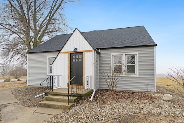 view of front of home with roof with shingles