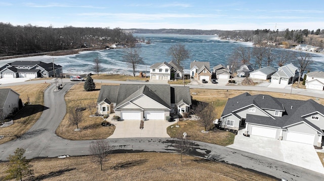 aerial view featuring a water view and a residential view