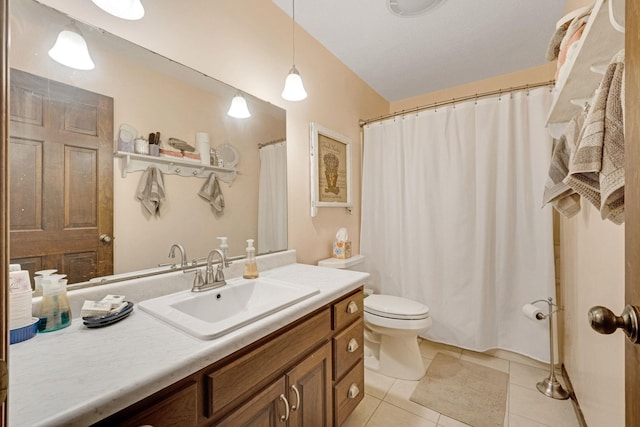 bathroom featuring vanity, curtained shower, tile patterned flooring, and toilet