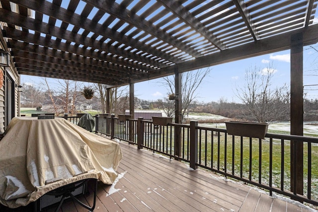 wooden deck featuring a pergola