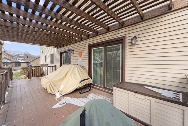 wooden deck featuring a pergola