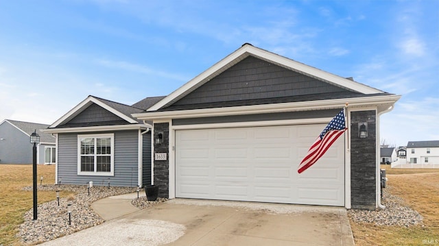 single story home with a garage and concrete driveway