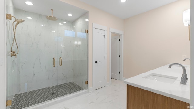 bathroom featuring double vanity, a marble finish shower, marble finish floor, a sink, and recessed lighting