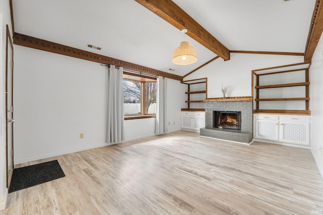 unfurnished living room with vaulted ceiling with beams, visible vents, baseboards, light wood-type flooring, and a brick fireplace