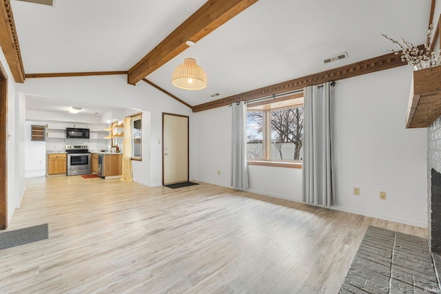 unfurnished living room featuring lofted ceiling with beams, light wood finished floors, a brick fireplace, and visible vents