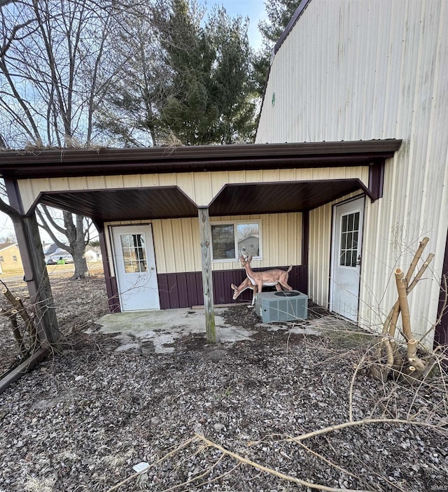 view of outbuilding featuring central air condition unit