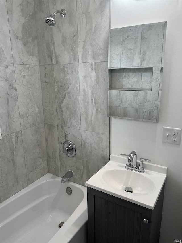 full bathroom with vanity and bathing tub / shower combination