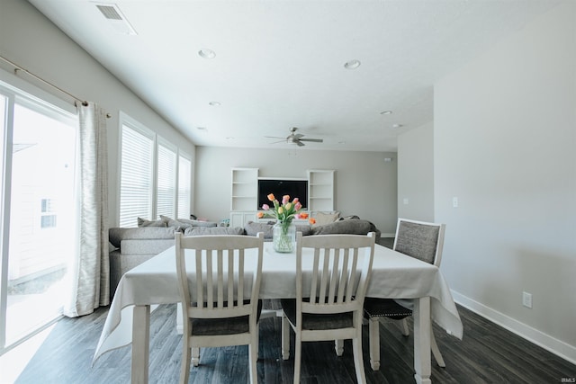 dining room with visible vents, baseboards, wood finished floors, and recessed lighting