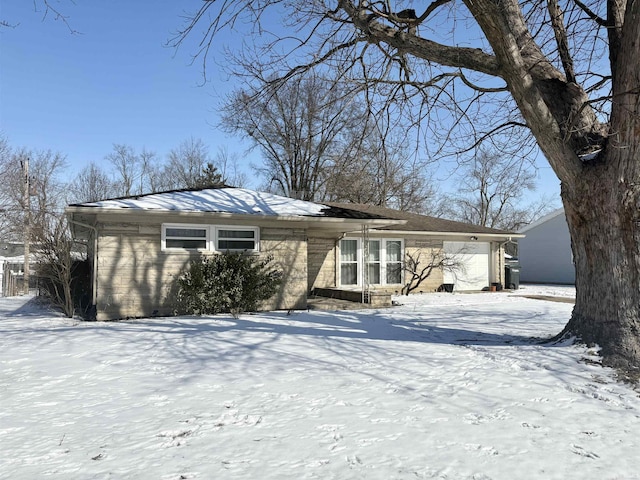 view of front of property featuring an attached garage