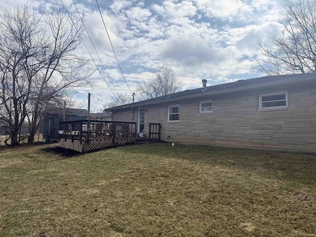 view of yard featuring a wooden deck