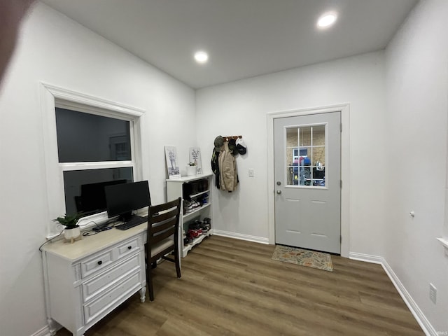 office featuring baseboards, dark wood-style flooring, and recessed lighting