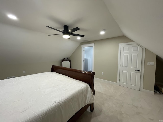 bedroom featuring lofted ceiling, recessed lighting, light colored carpet, and baseboards