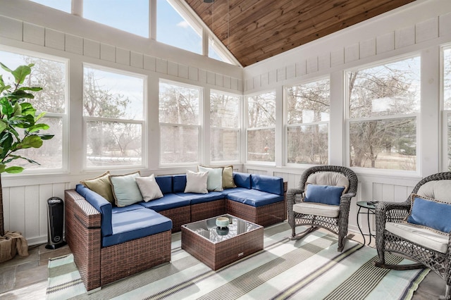 sunroom with vaulted ceiling and wood ceiling