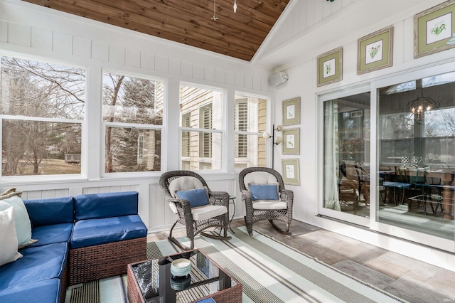 sunroom with vaulted ceiling and wooden ceiling