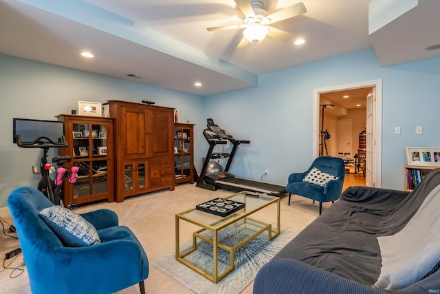 living room featuring light carpet, a ceiling fan, visible vents, and recessed lighting