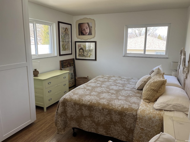 bedroom featuring wood finished floors