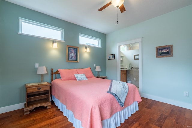 bedroom with a ceiling fan, wood finished floors, connected bathroom, and baseboards