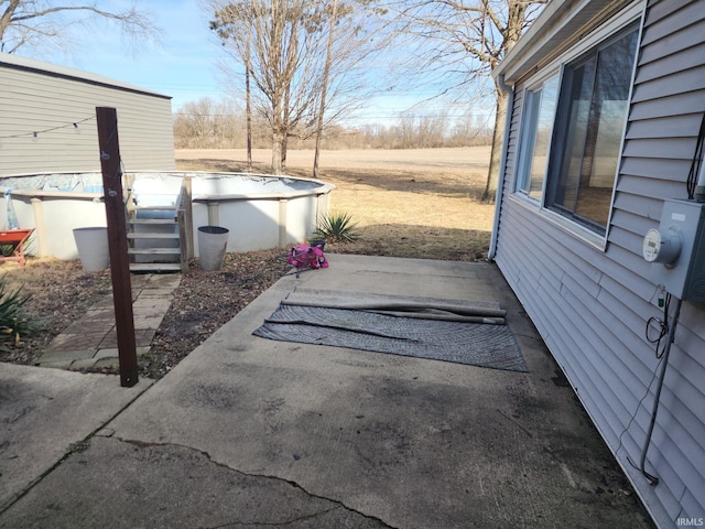 view of patio / terrace with an outdoor pool