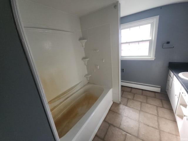 full bath with a baseboard radiator, bathtub / shower combination, and vanity