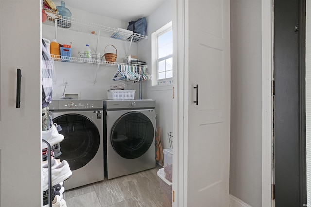 laundry area featuring laundry area and washer and clothes dryer