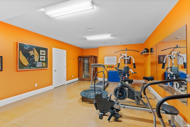 exercise area with baseboards