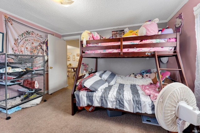 bedroom featuring carpet, crown molding, and a textured ceiling