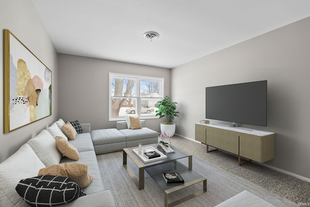 living area with baseboards, visible vents, and carpet flooring